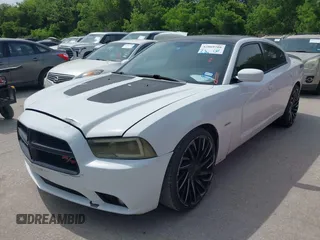 2013 Dodge Charger RT with VIN 2C3CDXCT1DH654737, listed as a IAAI auction lot 42069208 with 226,509 mi miles. Bid and sale history available at carsss.com. Image 2.