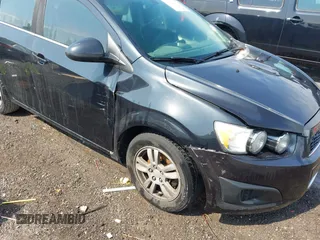 2014 Chevrolet Sonic LT with VIN 1G1JC5SH8E4168554, listed as a IAAI auction lot 42129823 with 276,709 mi miles and . Bid and sale history available at DreamBid. Image 6.