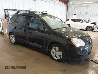 2009 Kia Rondo LX with VIN KNAFG528297278647, listed as a IAAI auction lot 42139810 with 161,314 mi miles. Bid and sale history available at carsss.com. Image 1.