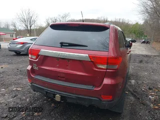 2012 Jeep Grand Cherokee Laredo with VIN 1C4RJFAG7CC123669, listed as a IAAI auction lot 42001472 with 164,806 mi miles. Bid and sale history available at carsss.com. Image 20.