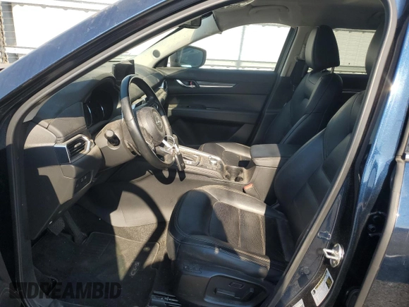 2021 Mazda CX-5 Grand Touring with VIN JM3KFADM7M0385788, listed as a Copart auction lot 88065255 with 27,787 mi miles and Salvage Title. Bid and sale history available at carsss.com. Image 7.