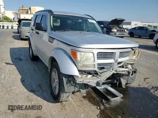2011 Dodge Nitro SXT z VIN 1D4PT5GK5BW541154, wystawiony jako Copart lot #72741154 z przebiegiem 154 746 mil mil oraz Szkoda całkowita • Salvage title. Historia ofert i sprzedaży dostępna na DreamBid. Obrazek 12.