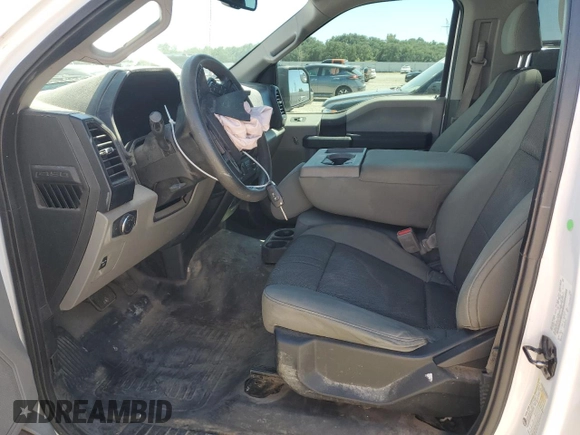 2016 Ford F-150 XL with VIN 1FTMF1C87GKE17279, listed as a Copart auction lot 56022125 with 144,209 mi miles and Salvage title. Bid and sale history available at DreamBid. Image 7.