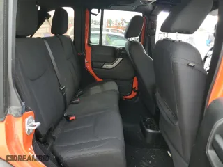 2015 Jeep Wrangler Unlimited Sport with VIN 1C4HJWDGXFL726174, listed as a Copart auction lot 51895295 with 107,377 mi miles and Salvage Title. Bid and sale history available at carsss.com. Image 11.