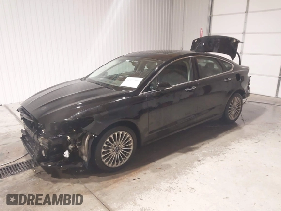 2016 Ford Fusion Titanium with VIN 3FA6P0K96GR197709, listed as a IAAI auction lot 40977902 with 135,259 mi miles. Bid and sale history available at carsss.com. Image 2.
