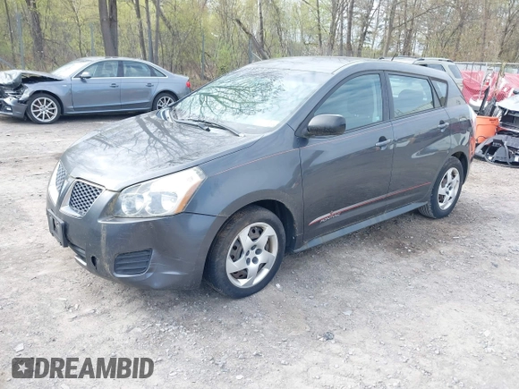 2009 Pontiac Vibe w/1SA with VIN 5Y2SL67859Z404323, listed as a IAAI auction lot 42172647 with 179,874 mi miles. Bid and sale history available at carsss.com. Image 2.