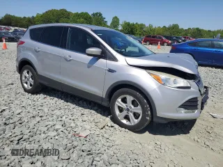 2015 Ford Escape SE with VIN 1FMCU9G94FUA09954, listed as a Copart auction lot 54374855 with 137,520 mi miles and Salvage Title. Bid and sale history available at DreamBid. Image 4.