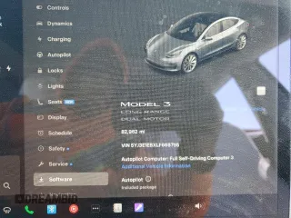 2020 Tesla Model 3 Long Range with VIN 5YJ3E1EBXLF668795, listed as a Copart auction lot 49913515 with 82,962 mi miles and Salvage Title. Bid and sale history available at DreamBid. Image 9.