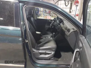 2018 Volkswagen Tiguan SEL with VIN 3VV2B7AX8JM113976, listed as a IAAI auction lot 42310576 with 100,319 mi miles and . Bid and sale history available at DreamBid. Image 5.