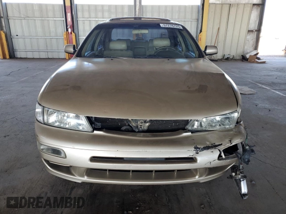 1998 Nissan Maxima GXE с VIN JN1CA21DXWT527738, выставлен на аукционе Copart как лот 57276725 с пробегом 109 453 миль миль и Списание • Salvage title. История ставок и продаж доступна на DreamBid. Изображение 5.