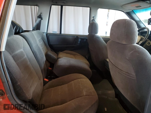 1997 Jeep Grand Cherokee Laredo with VIN 1J4GZ58SXVC723703, listed as a Copart auction lot 89216845 with 247,398 mi miles and Clean Title. Bid and sale history available at carsss.com. Image 11.