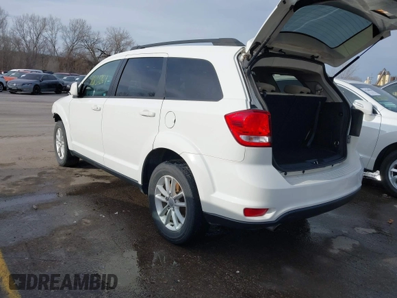 2016 Dodge Journey SXT with VIN 3C4PDCBG0GT206463, listed as a IAAI auction lot 41832864 with 135,409 mi miles. Bid and sale history available at carsss.com. Image 3.