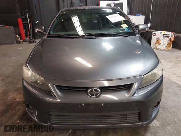 2012 Scion tC with VIN JTKJF5C7XC3034998, listed as a IAAI auction lot 41591632 with 171,121 mi miles. Bid and sale history available at carsss.com. Image 12.