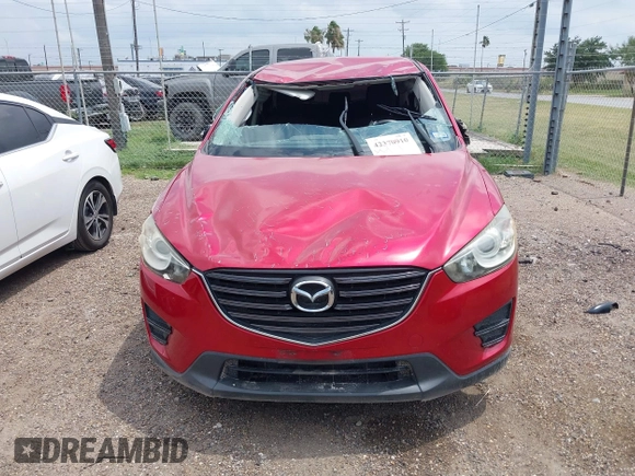 2016 Mazda CX-5 Sport with VIN JM3KE2BYXG0668401, listed as a IAAI auction lot 42370910 with Not provided miles and . Bid and sale history available at DreamBid. Image 13.