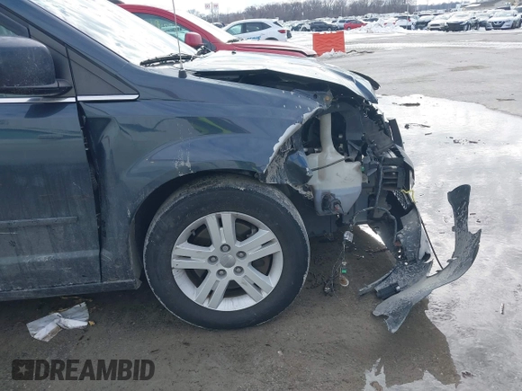 2013 Dodge Grand Caravan Crew with VIN 2C4RDGDG9DR740086, listed as a IAAI auction lot 41362852 with 145,881 mi miles and . Bid and sale history available at DreamBid. Image 6.