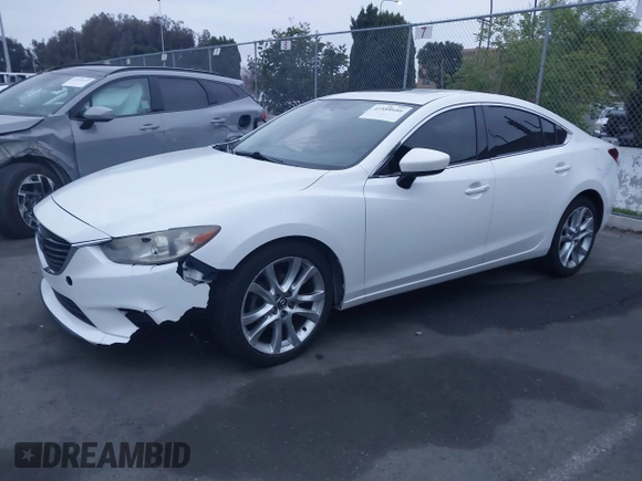 2016 Mazda Mazda6 i Touring with VIN JM1GJ1V52G1468807, listed as a IAAI auction lot 41888686 with 121,764 mi miles. Bid and sale history available at carsss.com. Image 19.
