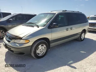 1999 Dodge Caravan SE with VIN 1B4GP44G5XB904043, listed as a Copart auction lot 77331804 with 105,141 mi miles and Clean Title. Bid and sale history available at carsss.com. Image 1.