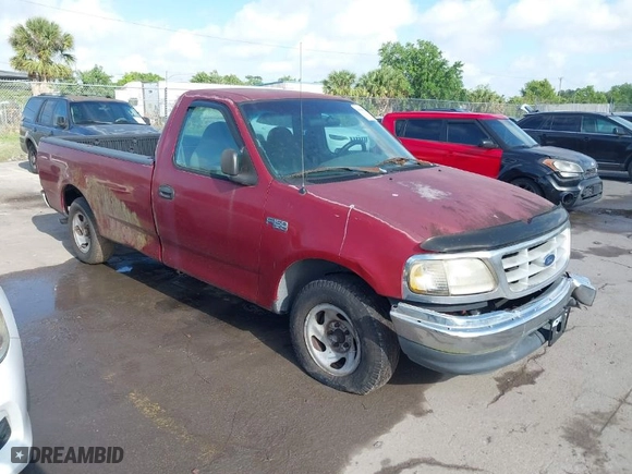 1999 Ford F-150 Work Series with VIN 1FTZF1727XKA70063, listed as a IAAI auction lot 41948032 with 134,642 mi miles. Bid and sale history available at carsss.com. Image 1.