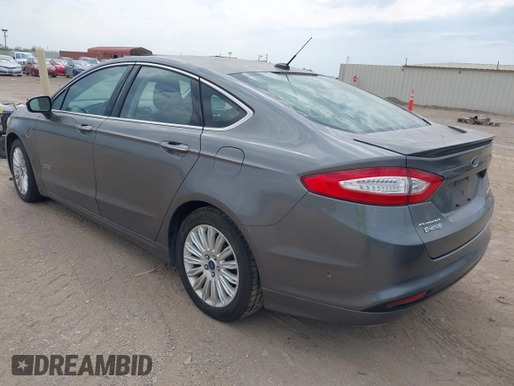 2014 Ford Fusion Titanium with VIN 3FA6P0SU0ER269411, listed as a IAAI auction lot 42163704 with 169,355 mi miles and . Bid and sale history available at DreamBid. Image 3.