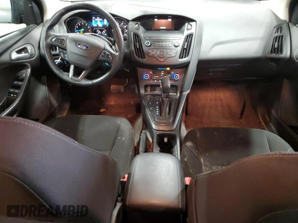 2018 Ford Focus SE z VIN 1FADP3FE4JL289830, wystawiony jako Copart lot #53350265 z przebiegiem 72 963 mil mil oraz Szkoda całkowita • Salvage title. Historia ofert i sprzedaży dostępna na DreamBid. Obrazek 8.