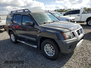 2015 Nissan Xterra S with VIN 5N1AN0NU6FN660956, listed as a Copart auction lot 85614714 with 59,821 mi miles and Salvage Title. Bid and sale history available at DreamBid. Image 4.