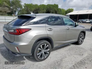 2017 Lexus RX 450h with VIN 2T2BGMCAXHC008829, listed as a Copart auction lot 61410365 with 70,463 mi miles and Salvage title. Bid and sale history available at DreamBid. Image 3.
