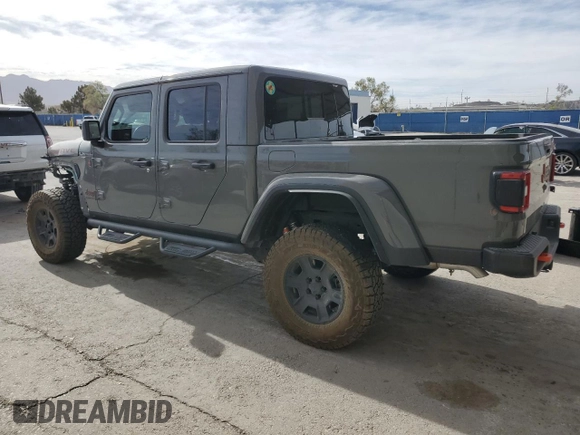 2023 Jeep Gladiator Mojave z VIN 1C6JJTEG7PL548084, wystawiony jako Copart lot #52827265 z przebiegiem 26 789 mil mil oraz Czysty tytuł • Clean title. Historia ofert i sprzedaży dostępna na DreamBid. Obrazek 2.