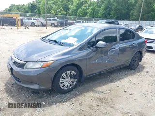 2012 Honda Civic LX z VIN 19XFB2F54CE038958, wystawiony jako IAAI lot #42136832 z przebiegiem 154 822 mil mil oraz . Historia ofert i sprzedaży dostępna na DreamBid. Obrazek 17.