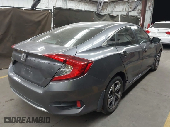 2020 Honda Civic LX with VIN 19XFC2F67LE006057, listed as a IAAI auction lot 42032759 with 119,319 mi miles and . Bid and sale history available at DreamBid. Image 4.