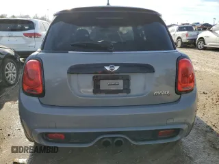 2014 MINI Hardtop S with VIN WMWXM7C57ET987816, listed as a Copart auction lot 41115434 with 122,724 mi miles and Salvage title. Bid and sale history available at DreamBid. Image 6.