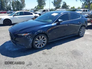 2020 Mazda 3 Select with VIN JM1BPACL8L1170671, listed as a IAAI auction lot 42703883 with 58,095 mi miles and . Bid and sale history available at DreamBid. Image 2.