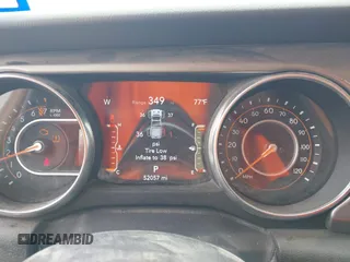 2023 Jeep Gladiator Overland z VIN 1C6HJTFG7PL566484, wystawiony jako IAAI lot #42424428 z przebiegiem 52 057 mil mil oraz . Historia ofert i sprzedaży dostępna na DreamBid. Obrazek 7.
