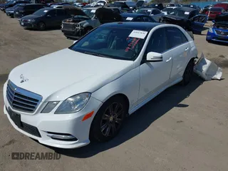 2013 Mercedes-Benz E-Class E 350 Luxury with VIN WDDHF5KB7DA739935, listed as a IAAI auction lot 41847836 with 136,783 mi miles. Bid and sale history available at carsss.com. Image 2.