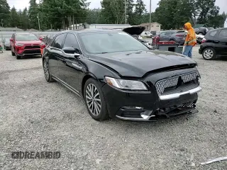 2017 Lincoln Continental Select z VIN 1LN6L9SK1H5637381, wystawiony jako Copart lot #60601455 z przebiegiem 57 017 mil mil oraz Szkoda całkowita • Salvage title. Historia ofert i sprzedaży dostępna na DreamBid. Obrazek 13.
