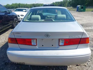 2001 Toyota Camry CE z VIN 4T1BG22K01U053432, wystawiony jako IAAI lot #42257822 z przebiegiem 128 610 mil mil oraz . Historia ofert i sprzedaży dostępna na DreamBid. Obrazek 16.