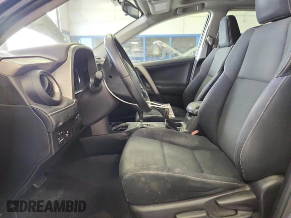2016 Toyota RAV4 XLE with VIN 2T3RFREV6GW451194, listed as a Copart auction lot 59293325 with 168,739 mi miles and Salvage title. Bid and sale history available at DreamBid. Image 7.