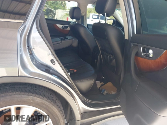 2016 Infiniti QX70 with VIN JN8CS1MU9GM671314, listed as a IAAI auction lot 42015268 with 122,850 mi miles and . Bid and sale history available at DreamBid. Image 8.