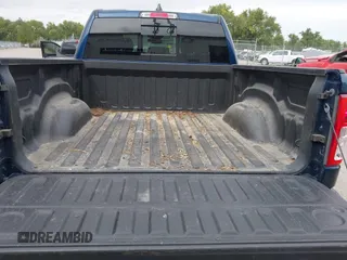 2019 Ram 1500 Big Horn/Lone Star with VIN 1C6SRFFT7KN663677, listed as a IAAI auction lot 40325088 with 77,035 mi miles. Bid and sale history available at carsss.com. Image 19.