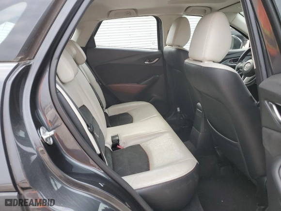 2016 Mazda CX-3 Grand Touring with VIN JM1DKBD72G0103803, listed as a Copart auction lot 82769204 with 91,727 mi miles and Salvage Title. Bid and sale history available at carsss.com. Image 11.