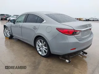 2016 Mazda 6 i Touring with VIN JM1GJ1V52G1463042, listed as a IAAI auction lot 42369747 with 136,849 mi miles and . Bid and sale history available at DreamBid. Image 3.