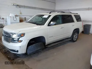 2015 Chevrolet Tahoe LTZ with VIN 1GNSKCKC9FR123996, listed as a IAAI auction lot 42113435 with 149,825 mi miles and . Bid and sale history available at DreamBid. Image 17.