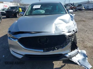 2019 Mazda CX-5 Sport with VIN JM3KFBBM7K0668830, listed as a IAAI auction lot 42069505 with Not Provided miles and . Bid and sale history available at DreamBid. Image 16.
