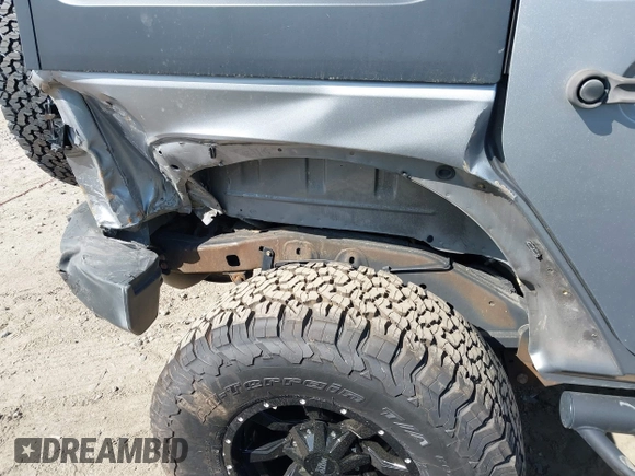 2015 Jeep Wrangler Unlimited Sahara with VIN 1C4BJWEG2FL558860, listed as a IAAI auction lot 41937360 with 113,627 mi miles. Bid and sale history available at carsss.com. Image 6.