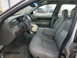 2004 Mercury Grand Marquis LS Premium z VIN 2MEFM75WX4X646351, wystawiony jako Copart lot #56770455 z przebiegiem 190 988 mil mil oraz Szkoda całkowita • Salvage title. Historia ofert i sprzedaży dostępna na DreamBid. Obrazek 7.