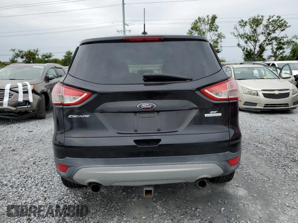 2013 Ford Escape SE with VIN 1FMCU0GX2DUD15316, listed as a Copart auction lot 62353865 with 81,848 mi miles and Clean title. Bid and sale history available at DreamBid. Image 6.