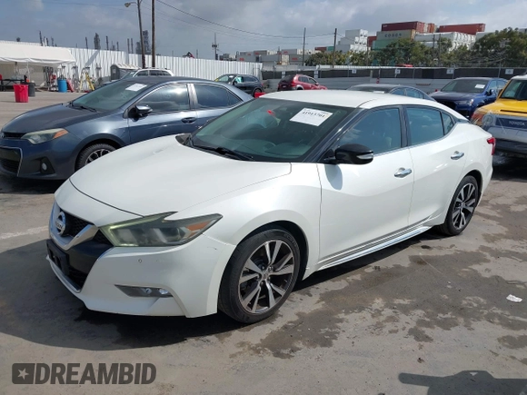 2016 Nissan Maxima S with VIN 1N4AA6AP2GC430689, listed as a IAAI auction lot 41913701 with 132,637 mi miles and . Bid and sale history available at DreamBid. Image 18.