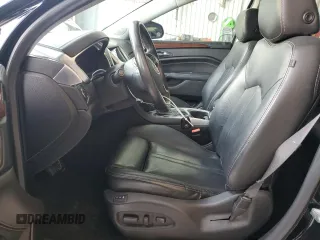 2015 Cadillac SRX Performance Collection with VIN 3GYFNCE34FS631491, listed as a Copart auction lot 64109575 with 102,763 mi miles and Salvage title. Bid and sale history available at DreamBid. Image 7.