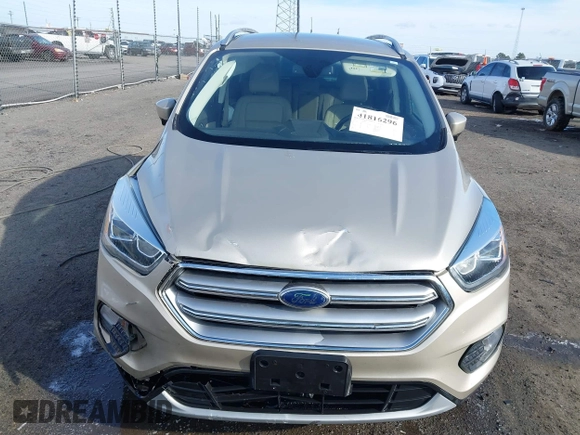 2017 Ford Escape Titanium with VIN 1FMCU0JD3HUB19602, listed as a IAAI auction lot 41816296 with 70,311 mi miles. Bid and sale history available at carsss.com. Image 6.