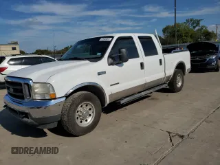 2002 Ford F-250 XL with VIN 1FTNW20F72EA79824, listed as a Copart auction lot 72986894 with 139,216 mi miles and Salvage title. Bid and sale history available at DreamBid. Image 1.