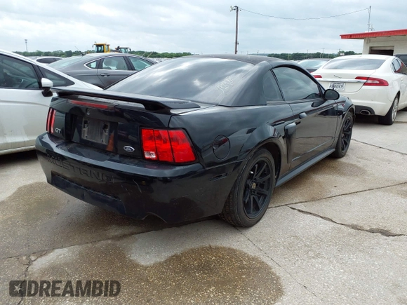 2003 Ford Mustang GT Deluxe with VIN 1FAFP42X33F398982, listed as a IAAI auction lot 42111539 with 80,051 mi miles. Bid and sale history available at carsss.com. Image 4.